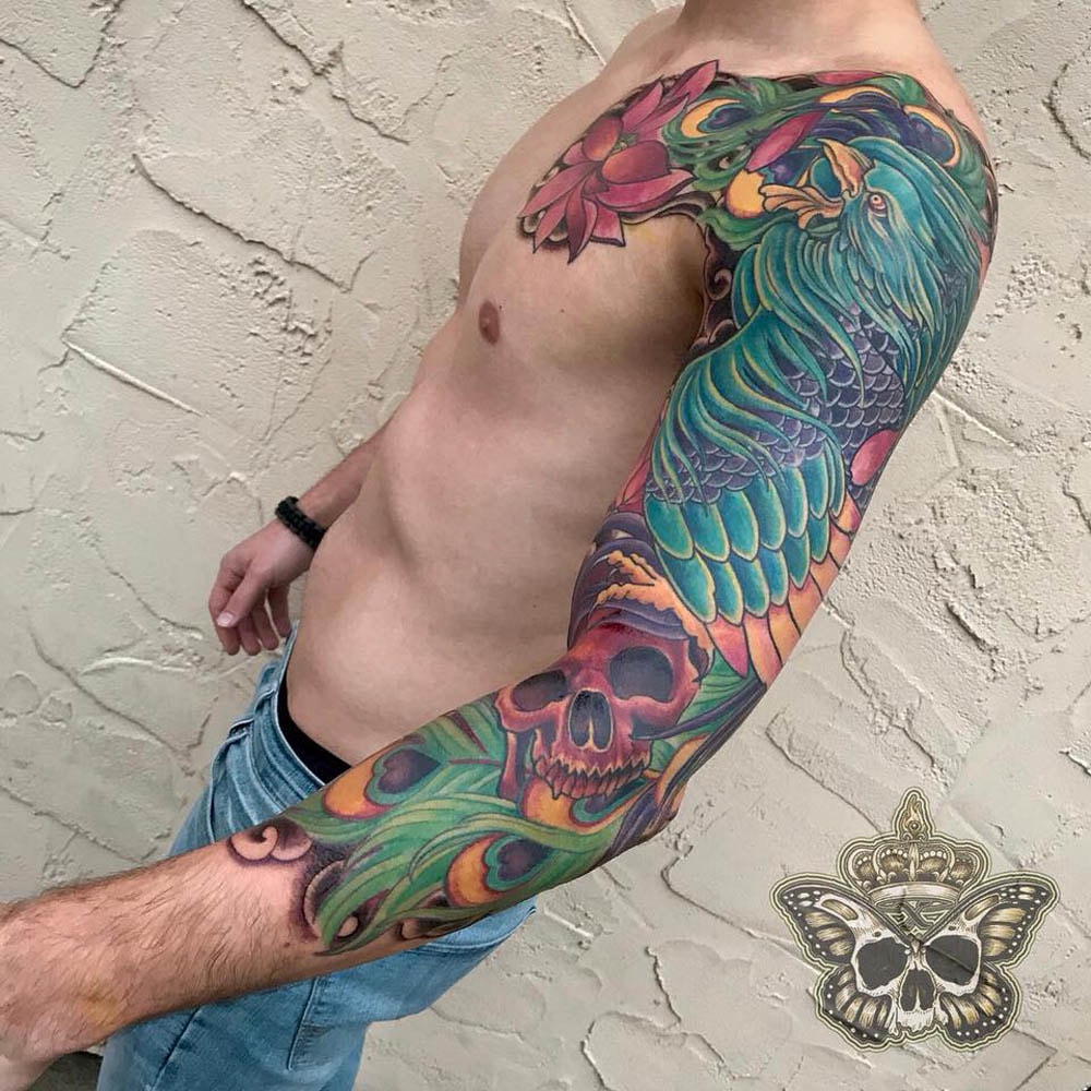 Phoenix and skull sleeve tattoo